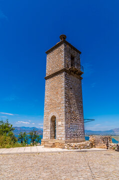 A view towards the clock tower in  the Acronauplia, fortress over the old town of Nafplio in Greece in early summertime