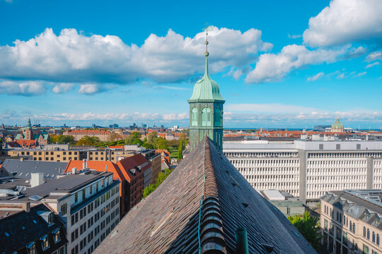 Trinitatis Church spire over Copenhagen rooftops