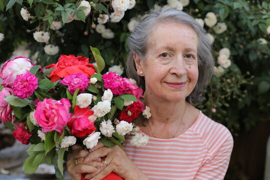 Senior woman receiving some flowers