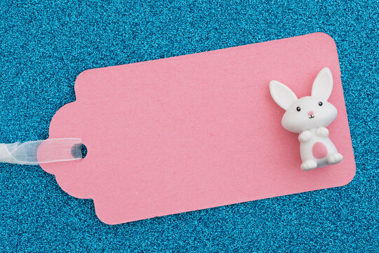 Easter bunny gift tag on blue glitter