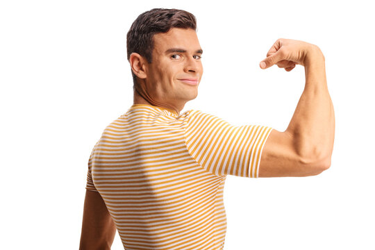 Young man flexing his bicep muscle and smiling