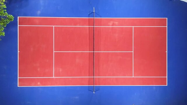 Cinematic video of a lawn tennis court at night 