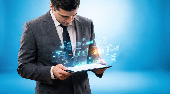 Holding a digital tablet at chest level, a faceless executive reviews a generic future strategy interface with holographic charts on a bright blue studio background, no readable text, strategy