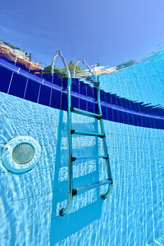 Swimming pool ladder taken from underwater