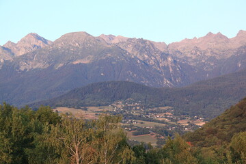 Obraz premium Belledonne mountain range lit by warm evening sunlight, French Alps, Isere, France.