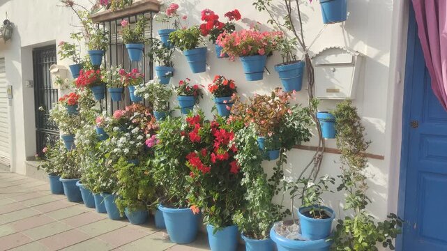 Traditional andalusian street decorated with flowers