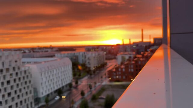 Sunset Cityscape of J&auml;tkasaari Helsinki with Warm Sky