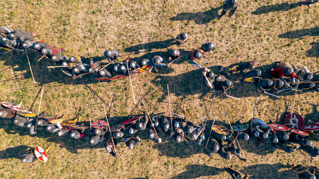 Raciborz, poland - june 6, 2026: medieval reenactment warriors forming a shield wall during historical battle