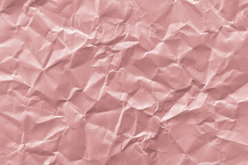 Fototapeta premium Textured pink crumpled paper background