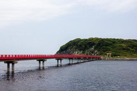 Red Oshima Bridge leading to the sacred Oshima Island in Fukui, Japan