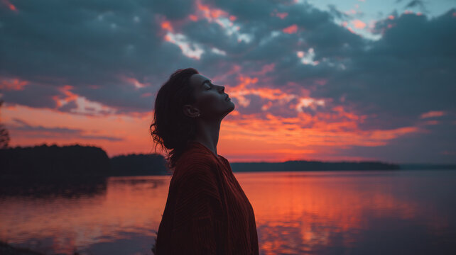 woman enjoying sunset alone, peaceful emotional mood