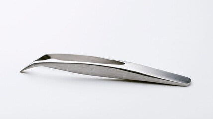 Fototapeta premium Professional sleek stainless steel tweezers with ergonomic design isolated on white background