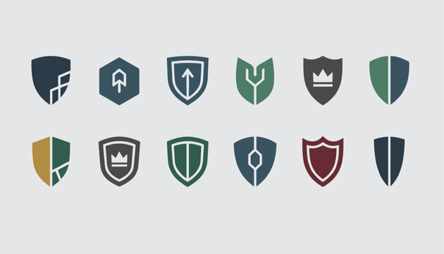 Modern selection of security shield logo icons with different inner emblems and designs set on a grey background.