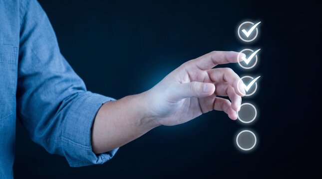 Hand selecting checkmarks on a digital interface
