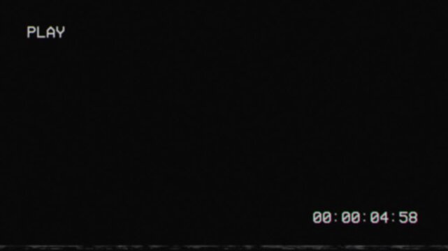 Retro vhs playback interface with timecode on black screen