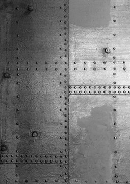 Large halftone riveted metal texture with a transparent background