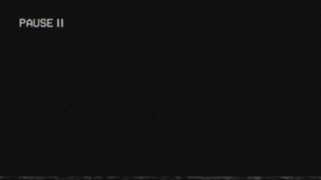 Vintage vhs pause screen overlay with analog distortion grain