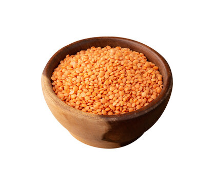 Orange lentil in a bowl isolated over white background