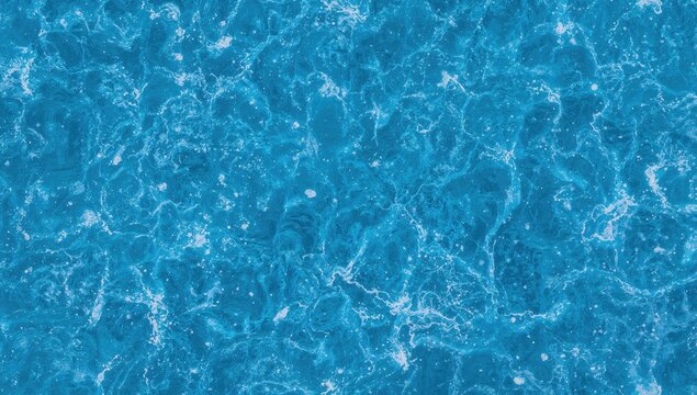 Turquoise Ocean Waves Texture Pattern Under Bright Light