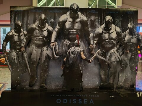 Ostia, Rome, Italy - July 22, 2026, advertising panel for director Christopher Nolan's film Odyssey, shot entirely with an IMAX camera, at Cineland Multiplex, Ostia's main multiplex cinema.