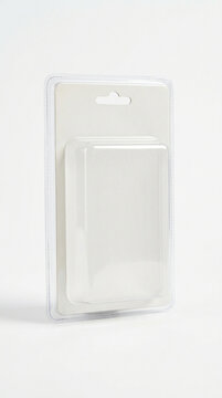 A clear plastic clamshell with a cardboard back and a realistic plastic sheen isolated on a solid white backdrop
