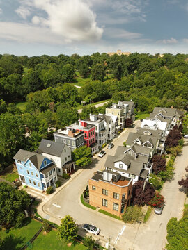 New colorful homes near downtown Raleigh, North Carolina with Dix Park in the distance