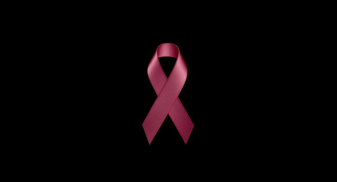 Symmetrical design with hidden pink ribbon symbolizing breast cancer awareness on dark backdrop