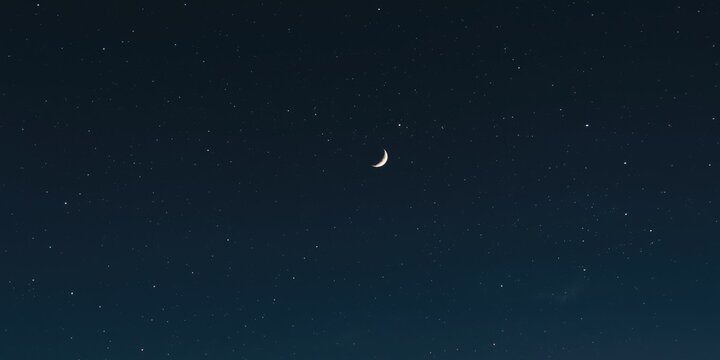 Crescent Moon Illuminating a Starry Night Sky