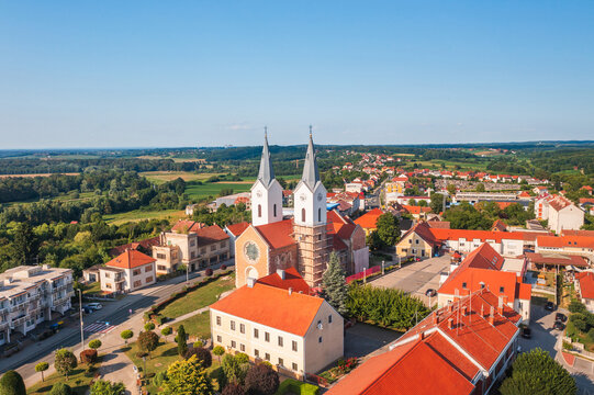 Aerial view church of St. Mary Magdalene in town of Cazma, Moslavina, Croatia
