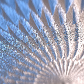 Macro Silver and Blue Embossed Metallic Feather Texture with Radial Ridges and Luminous Depth for Abstract Background