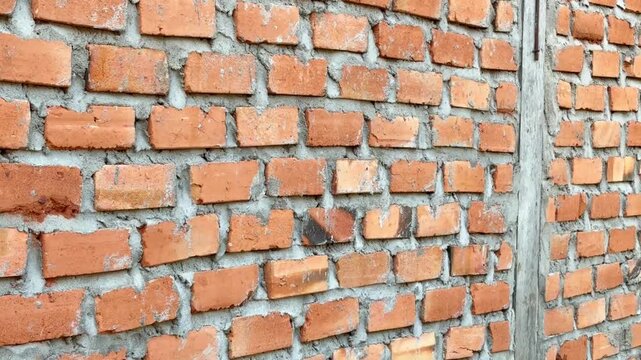 Close Up of Rough Red Brick Wall Texture with Grey Mortar