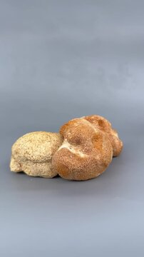 Dried Hericium erinaceus lion's mane fruiting bodies on a gray background, close-up shot. High quality 4k footage