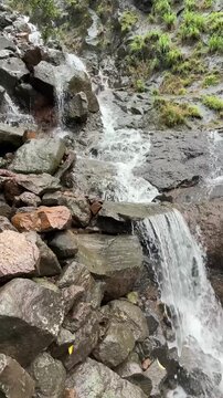 Waterfall gushing over rocks in the Western Ghats, Maharashtra, India.