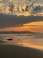 Fototapeta premium Sunset on As Catedrais Beach in Galicia, Spain