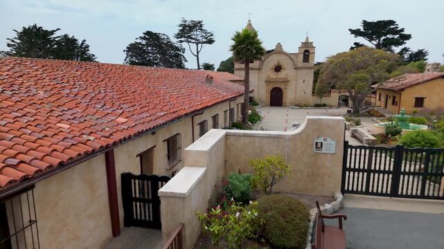 Explore the historic mission church in Carmel California with views of buildings and pathways in the area.
