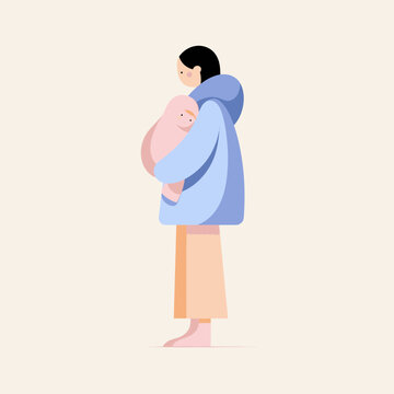 Mother Holding Baby in Cozy Blue Sweater