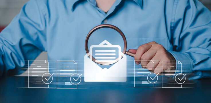Digital document management, open file auditing, professional searching and verification security data. Businessman holding smartphone with magnifying glass over folder icon and checkmarks.