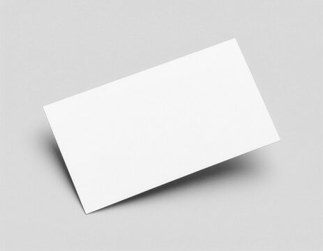 Blank white business card mockup template on gray studio background