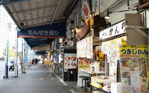 Tokyo -October 29 2025: restaurant and market stand in Tsukiji Outer Market.  Tsukiji Outer Market  is a district adjacent to the site of the former Tsukiji Wholesale Market