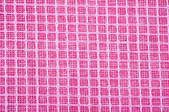 Pink fabric with woven grid pattern