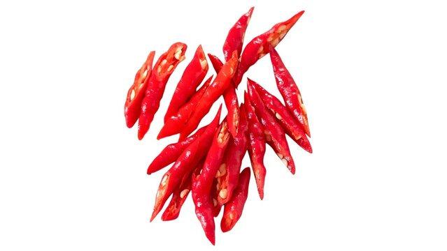 Pile of fresh sliced red chili peppers isolated on white background