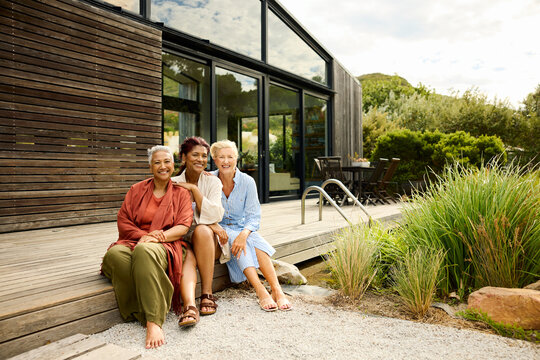 Friends Enjoy Time Together Outside a House
