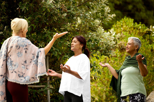 Three Women practicing meditation