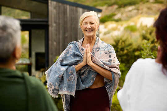 Yoga Instructor Leads Outdoor Class in Nature