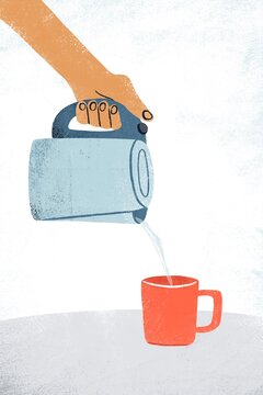 Hands pouring water from the kettle into the mug