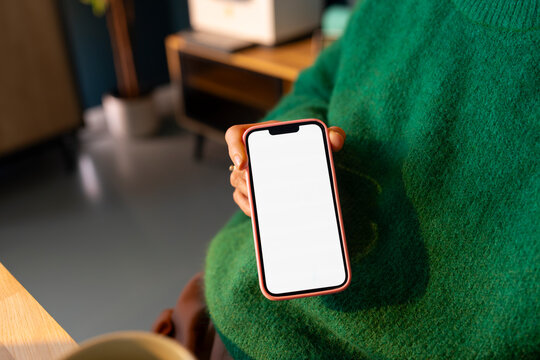 Holding a Smartphone with a Blank Screen