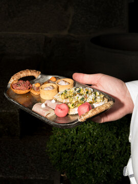 Assorted Gourmet Appetizers Presented on Serving Tray