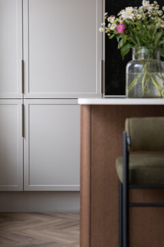 Mid century style kitchen with walnut wood and warm tones