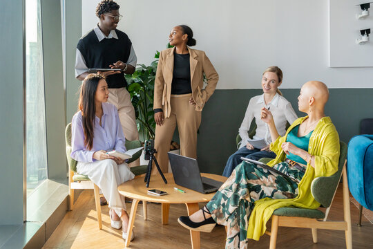 Work Group Meets in Office to Discuss Project Ideas and Share Thoughts