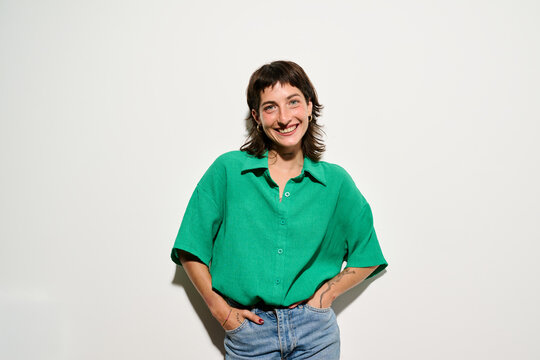 Direct flash Portrait of Smiling woman in green shirt